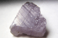 AXINITE (Manganoaxinite) - Silicati